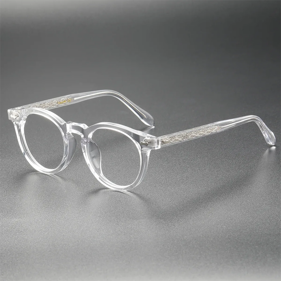 Clear transparent acetate eyeglass frames LE0084 on a dark gray studio background